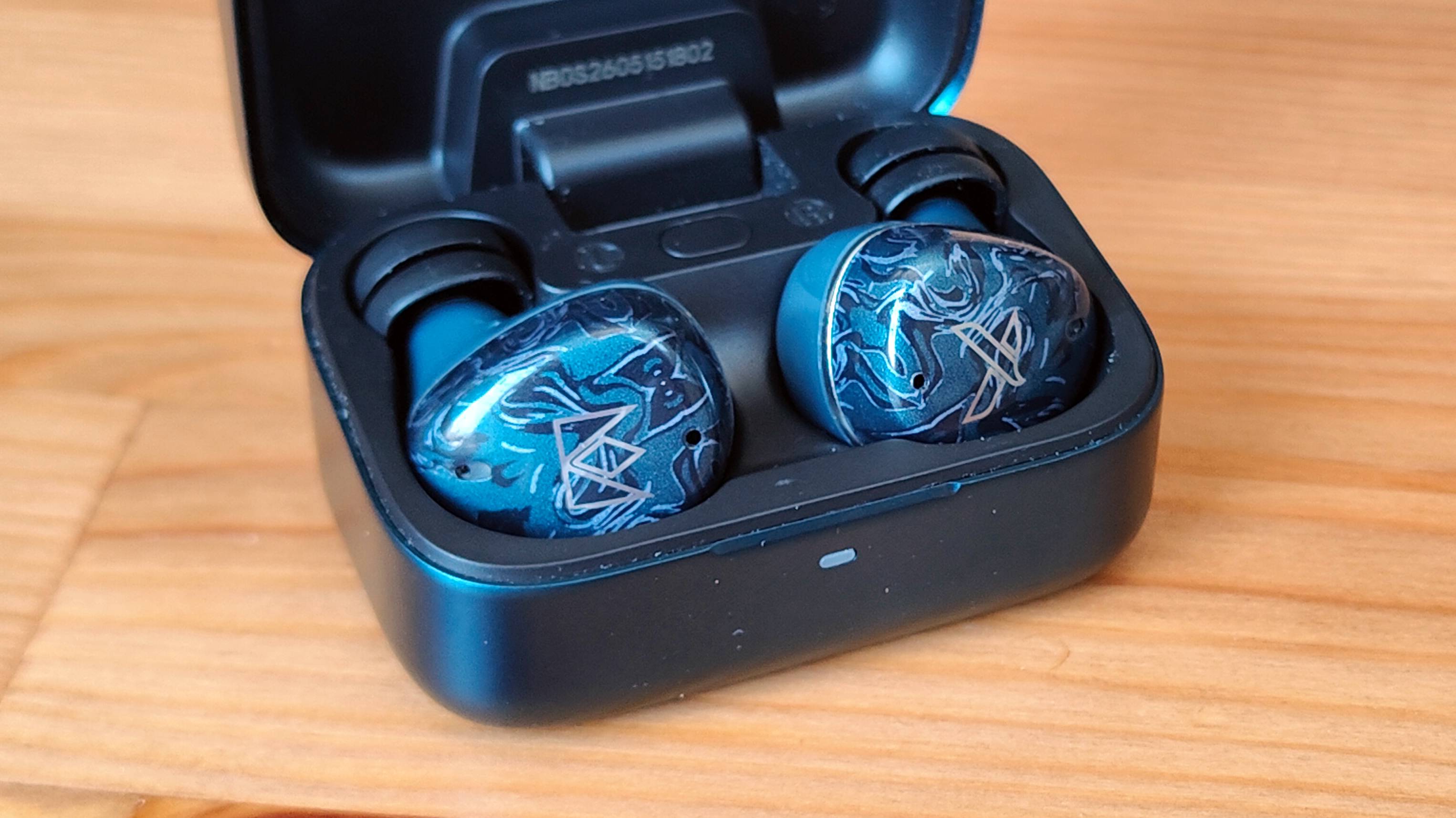 The Noble Osprey earbuds in their case.