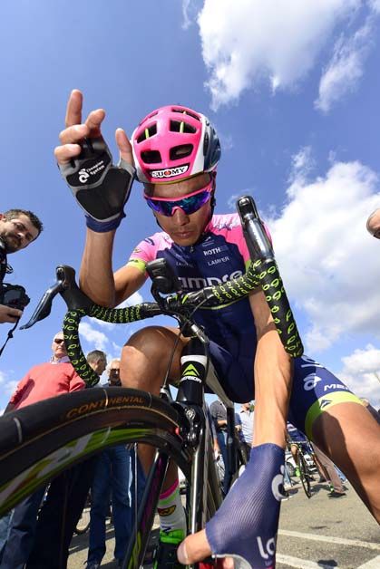 Gang Xu checks his bike