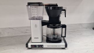 Technivorm Moccamaster Select with a carafe of fresh coffee