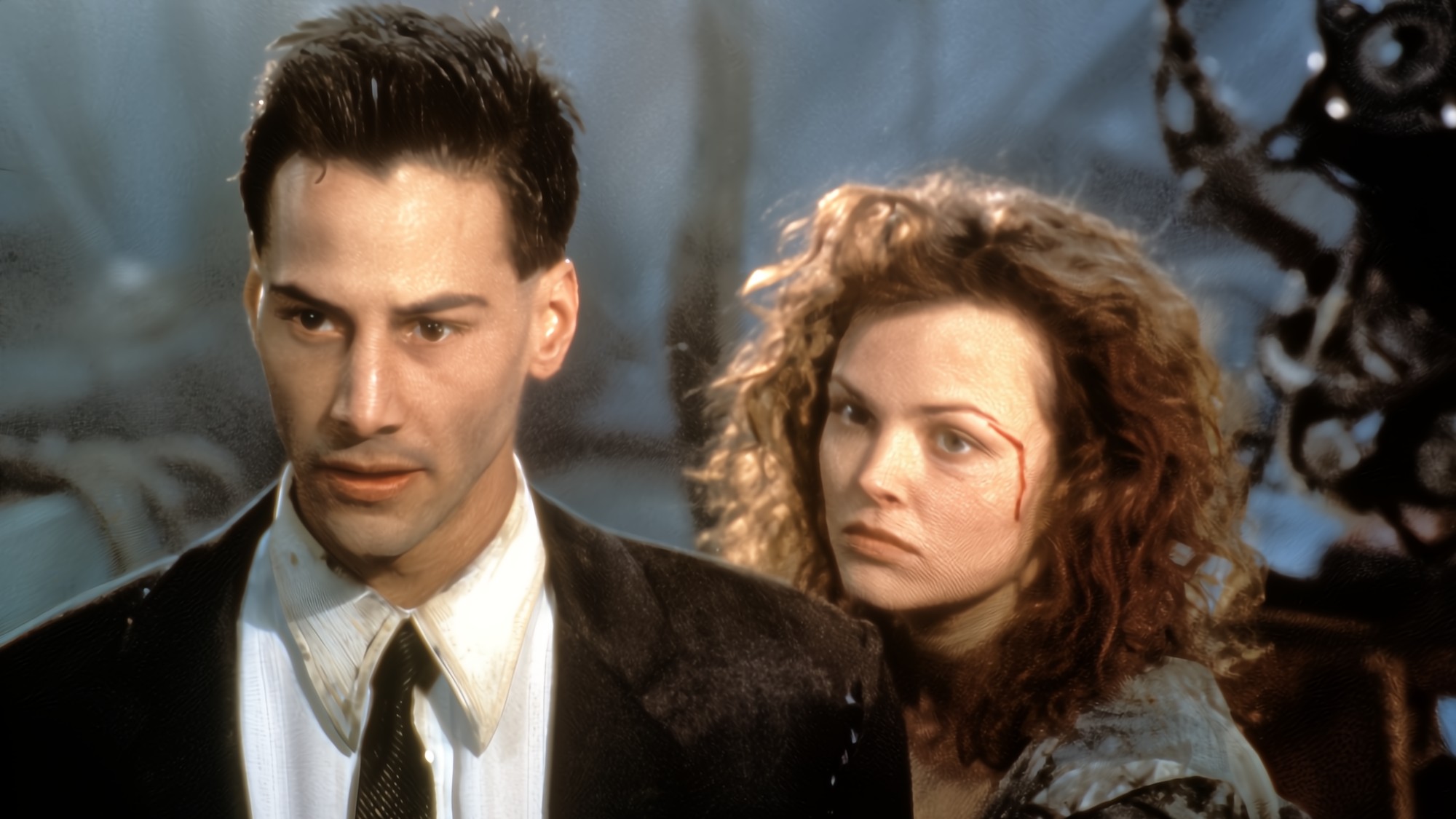Keanu Reeves and Dina Meyer in Johnny Mnemonic