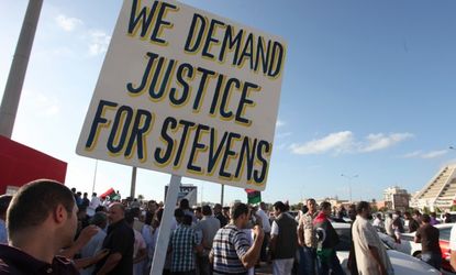 Libyan men protest in Benghazi on Sept. 21 after the attack that killed U.S. Ambassador Chris Stevens and three other Americans.