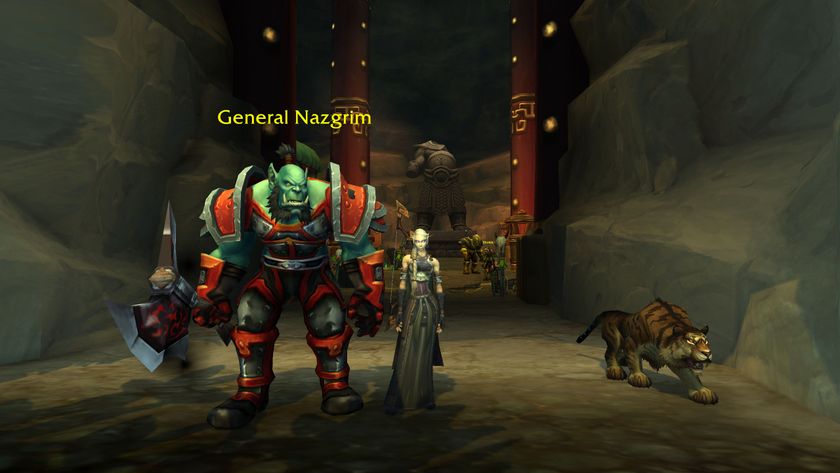 WoW Strongarm Tactics - general nazgrim is standing at a cave entrance with a blood elf player standing next to him