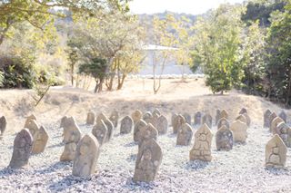 Tsuyoshi Ozawa’s Slag Buddha 88 art piece installed in situ in Japan