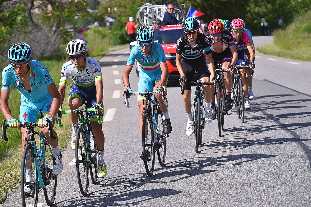 Vincenzo Nibali follows Esteban Chaves in the select lead group during stage 19.