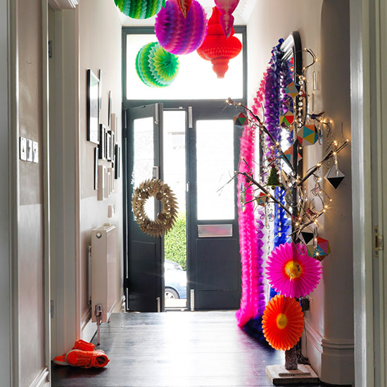 hallway with front door and wreath on door