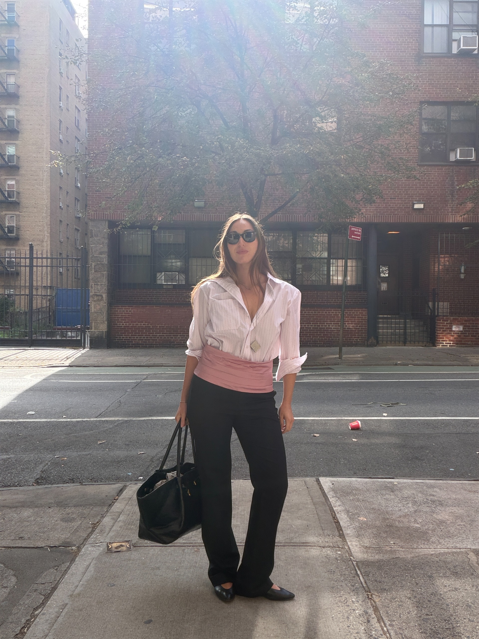 Senior fashion editor Anna LaPlaca wearing the cummerbund trend for fall 2026.