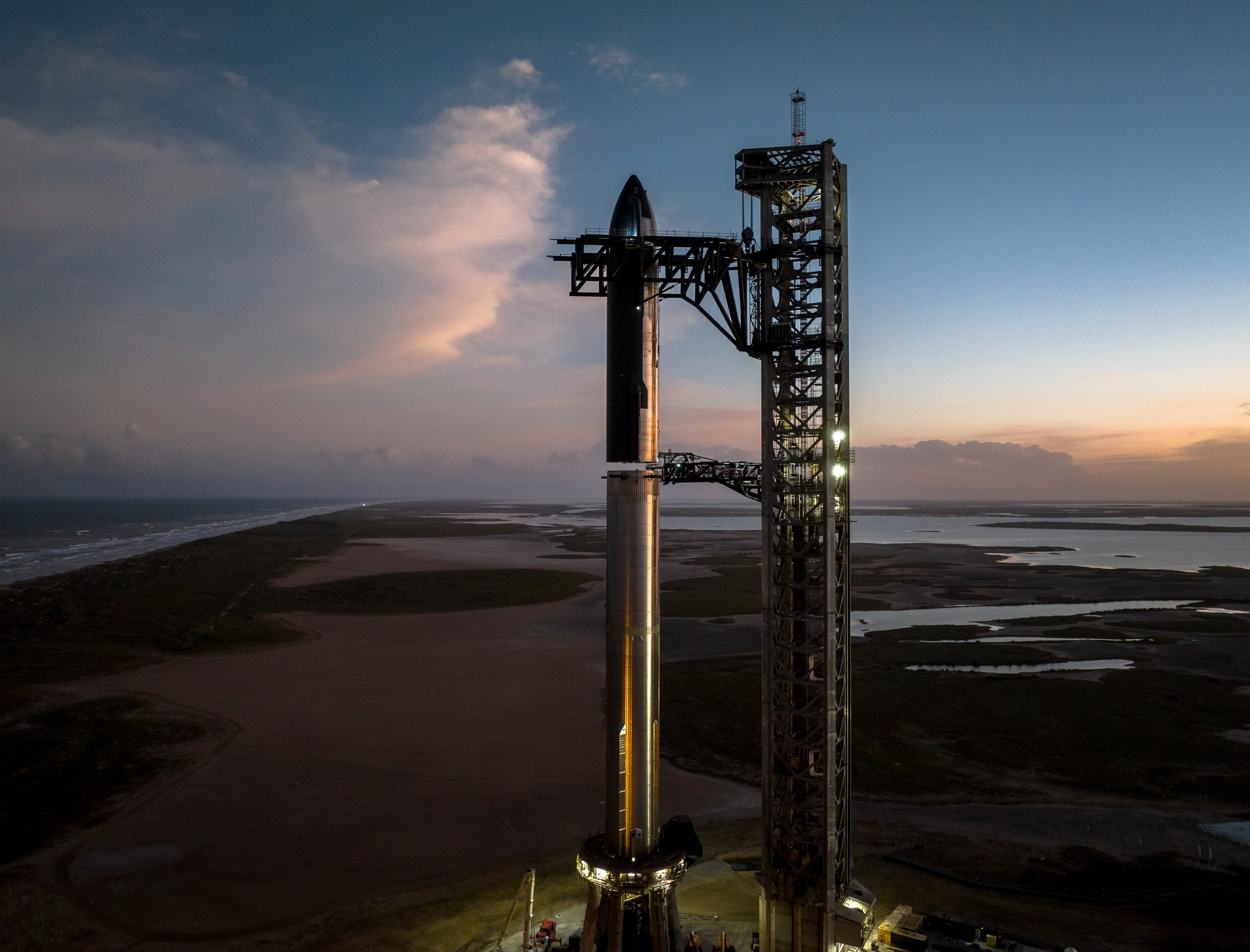 SpaceX Stacks Starship On Pad Ahead Of Orbital Test Flight photos Space
