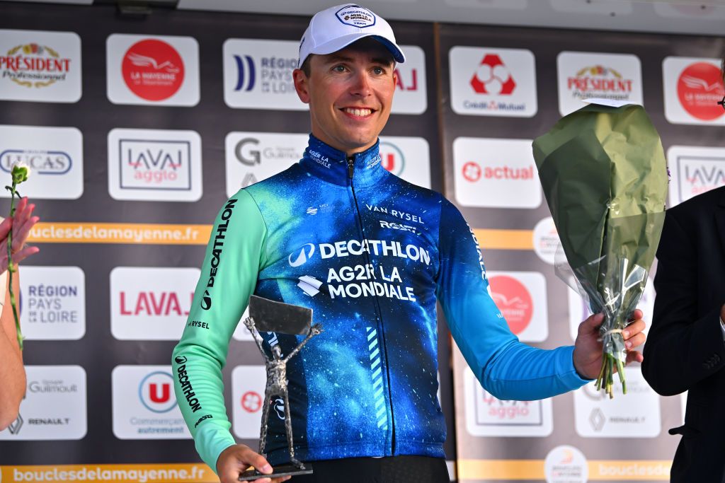 LAVAL FRANCE MAY 23 Benoit Cosnefroy of France and Decathlon AG2R La Mondiale Team celebrates at podium as stage winner during the 49th Boucles de la Mayenne 2024 Prologue a 54km individual time trial stage from Espace Mayenne Laval to Espace Mayenne Laval on May 23 2024 in Laval France Photo by Luc ClaessenGetty Images