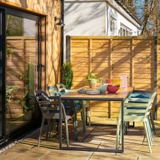 house with patio and dining area