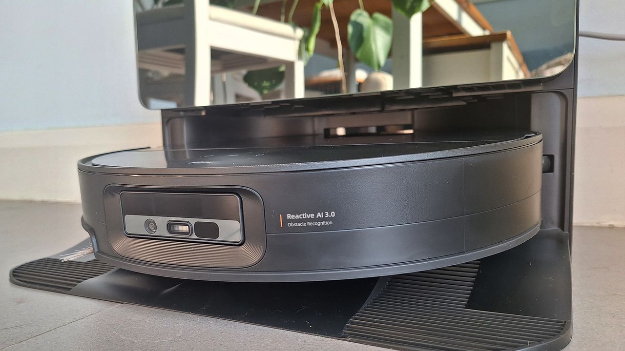 Roborock Saros 10 robot vacuum in its dock, in reviewer's home