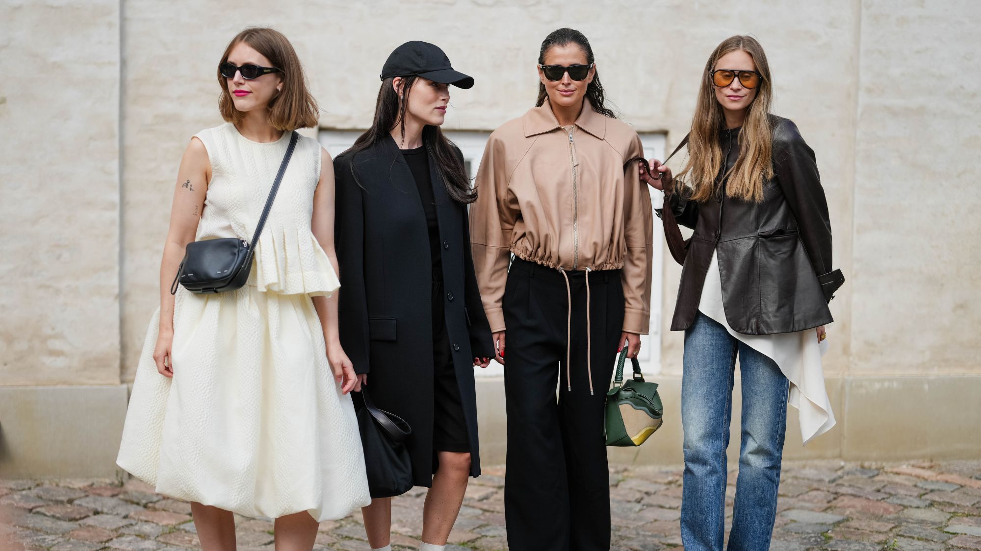 street style shot of four women at fashion week