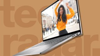 One of the best laptops under $1000/£1000 against a tan TechRadar background