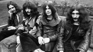 Black Sabbath sat on a bench in 1970