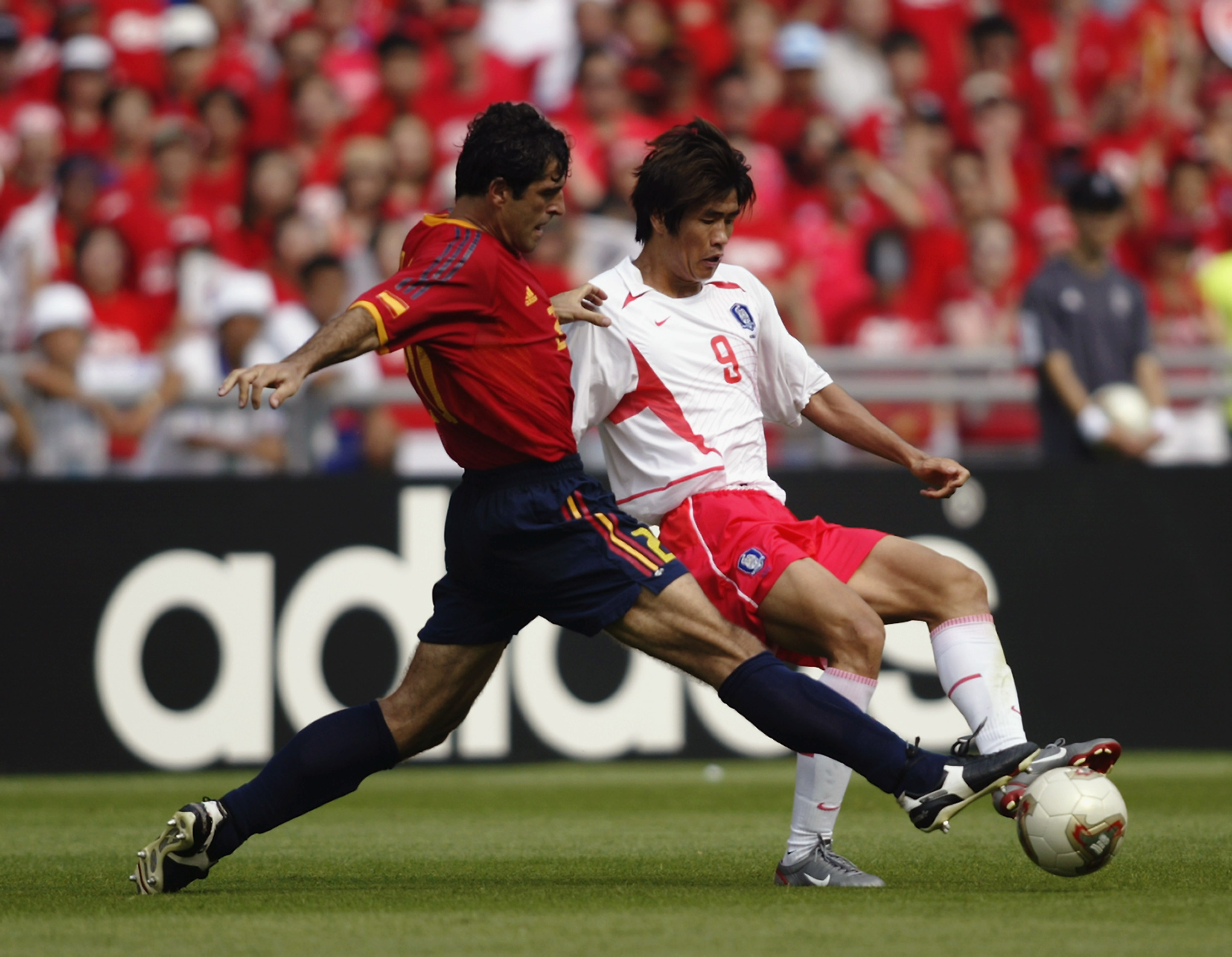 Spain defender Miguel Angel Nadal tackles South Korea's Seol Ki-hyeon at the 2002 World Cup.