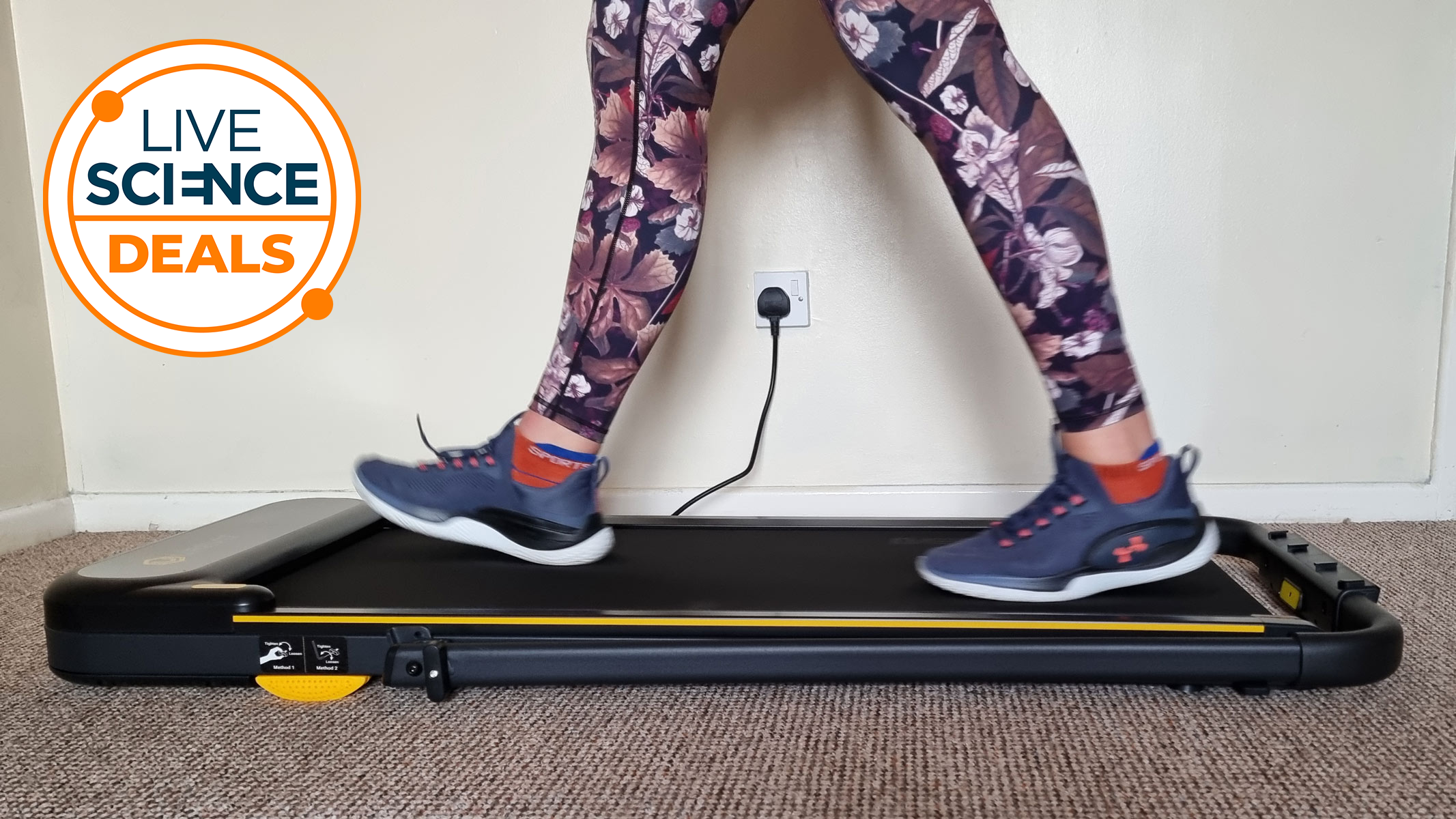 Reviewer Anna Gora walking on the Urevo Strol 2E Smart Treadmill
