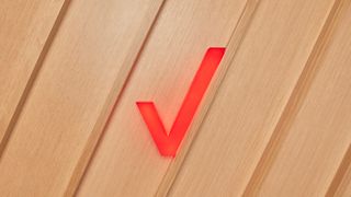 Verizon check mark on wood