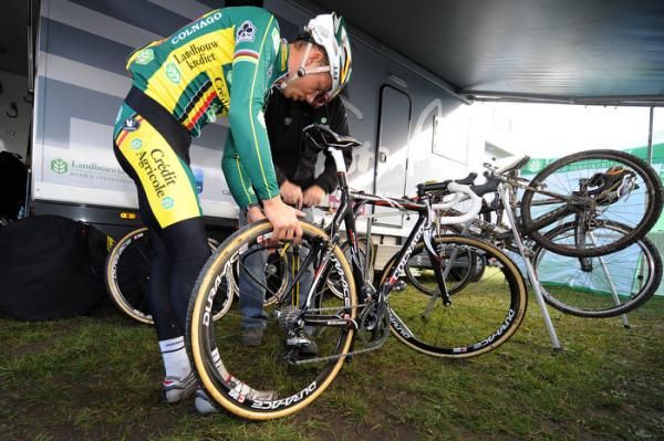 Sven Nijs checks his tyres before the race
