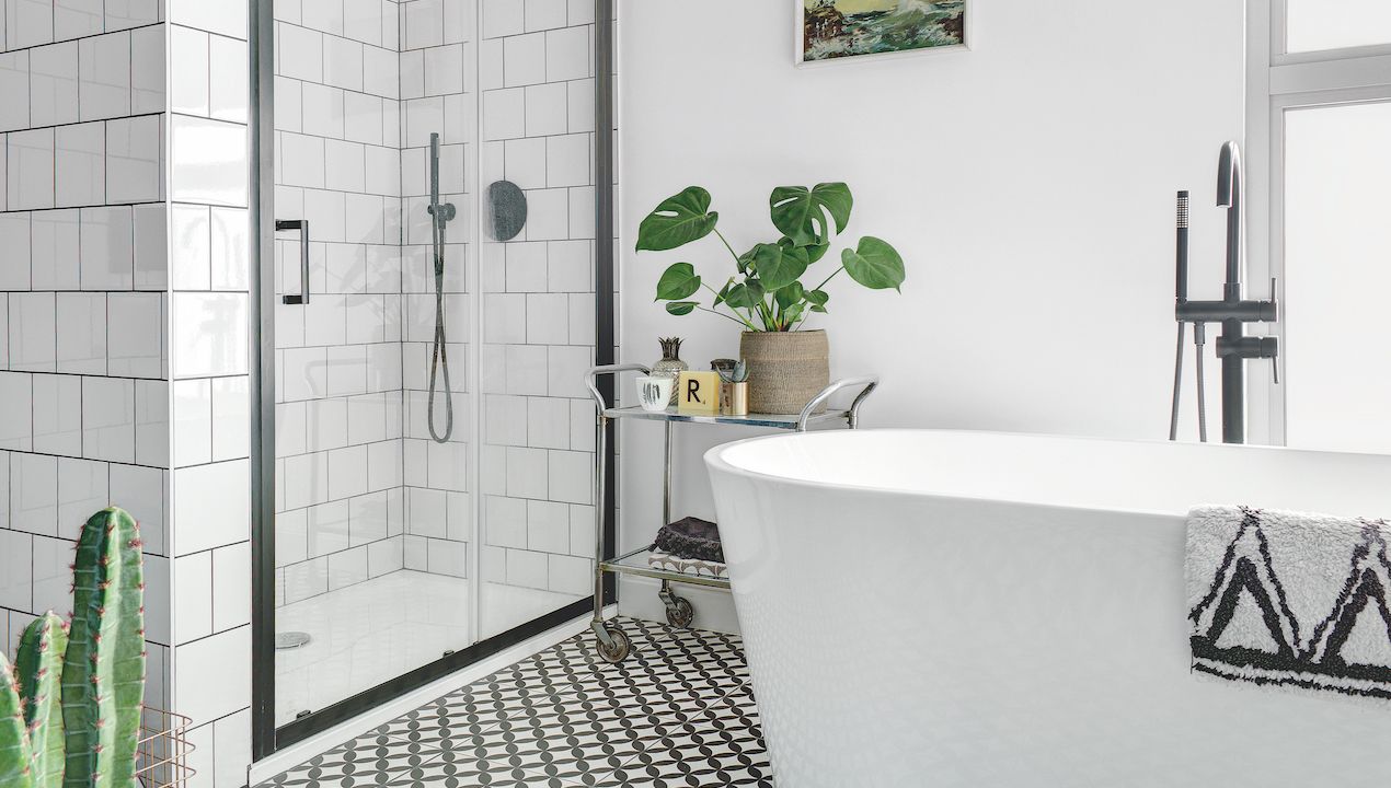 white bathroom with plants