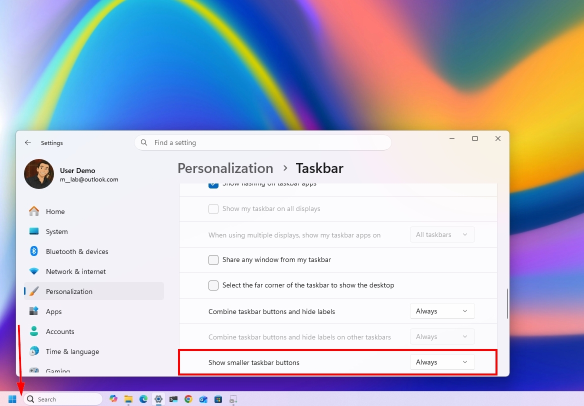 Windows 11 desktop with smaller taskbar set in the Settings app.