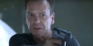 Close-up shot of Jack Bauer pointing a gun on 24. Kiefer Sutherland