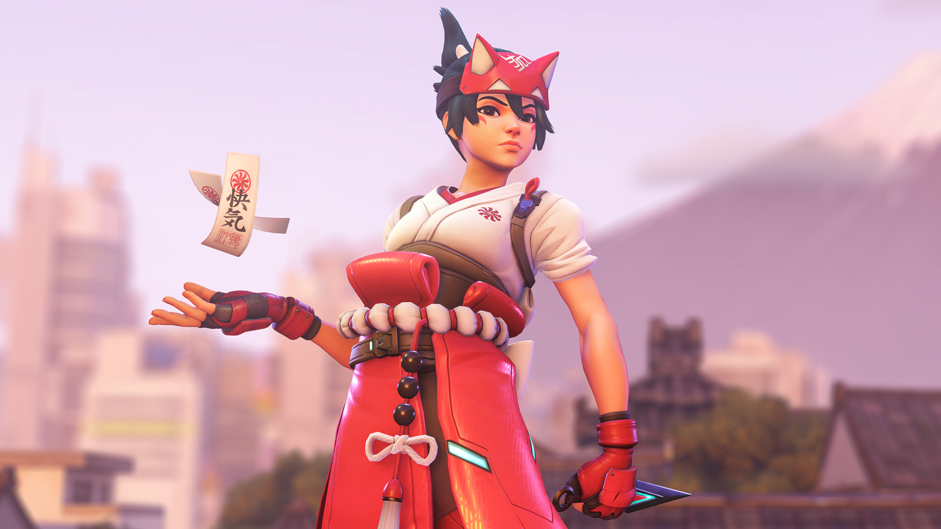 Kiriko in Overwatch 2 holding a knife and levitating two small parchments