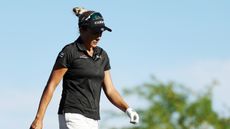 Lexi Thompson walks off the tee