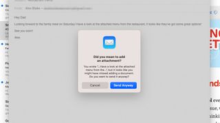 A dialog box in the Mail app in macOS Ventura asking if the user meant to attach a file to an outgoing email.