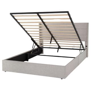 Greige hydraulic lift top storage bed with tall headboard and space underneath for storing