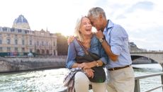 Senior couple in vacation, spending their holidays visiting the beautiful city of Paris, France.