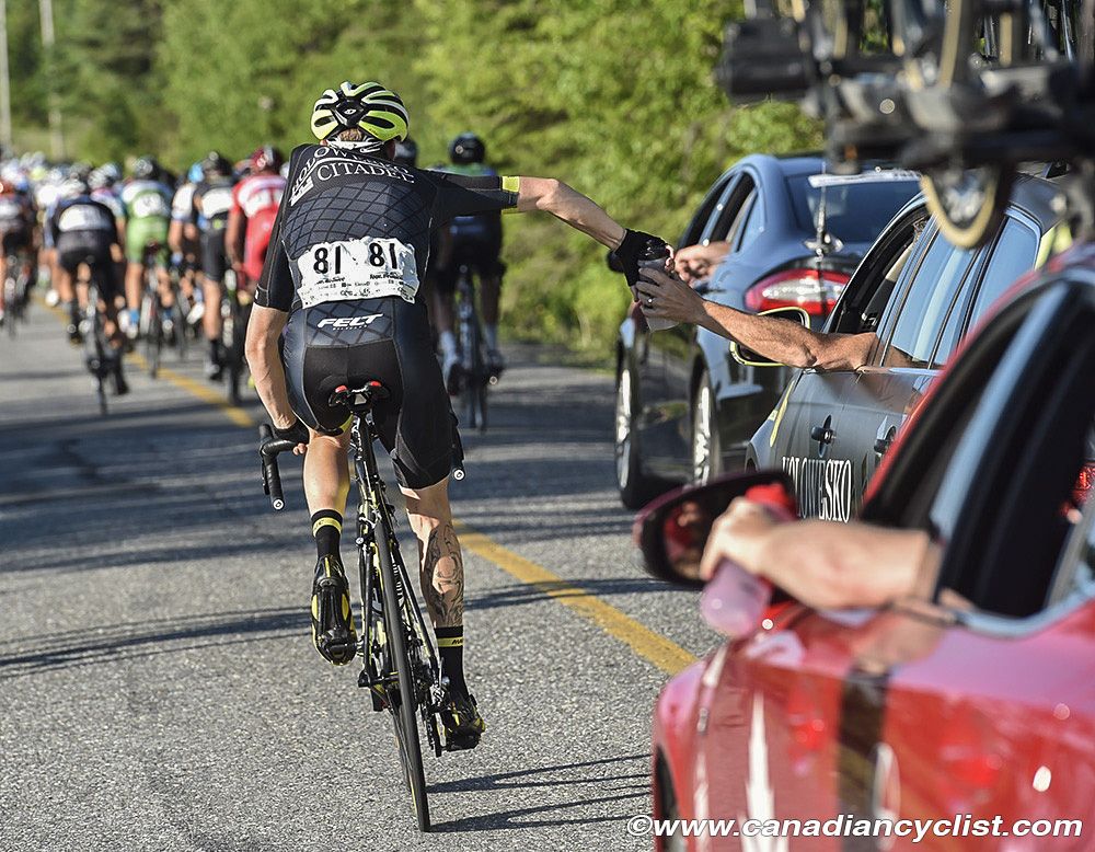 Taking on fuel mid-race at Tour de Beauce
