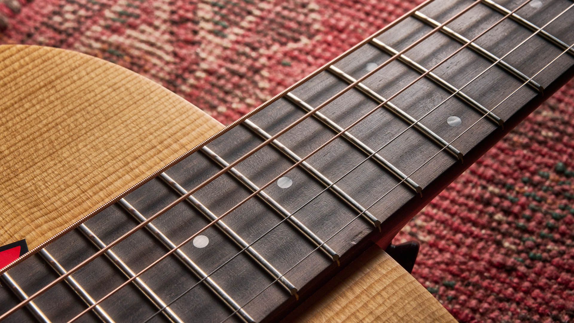 The Taylor Jacob Collier GS Mini is a compact five-string acoustic that encourages players to explore Collier's D-A-E-A-D tuning.