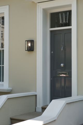 outdoor grade wall lighting on townhouse