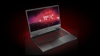 An Acer Nitro 5 gaming laptop against a balck background.