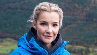 Helen Skelton wears a waterproof during a walk leading a group of young people from the PEEK project in Glasgow to the summit of Ben Nevis on October 11, 2019