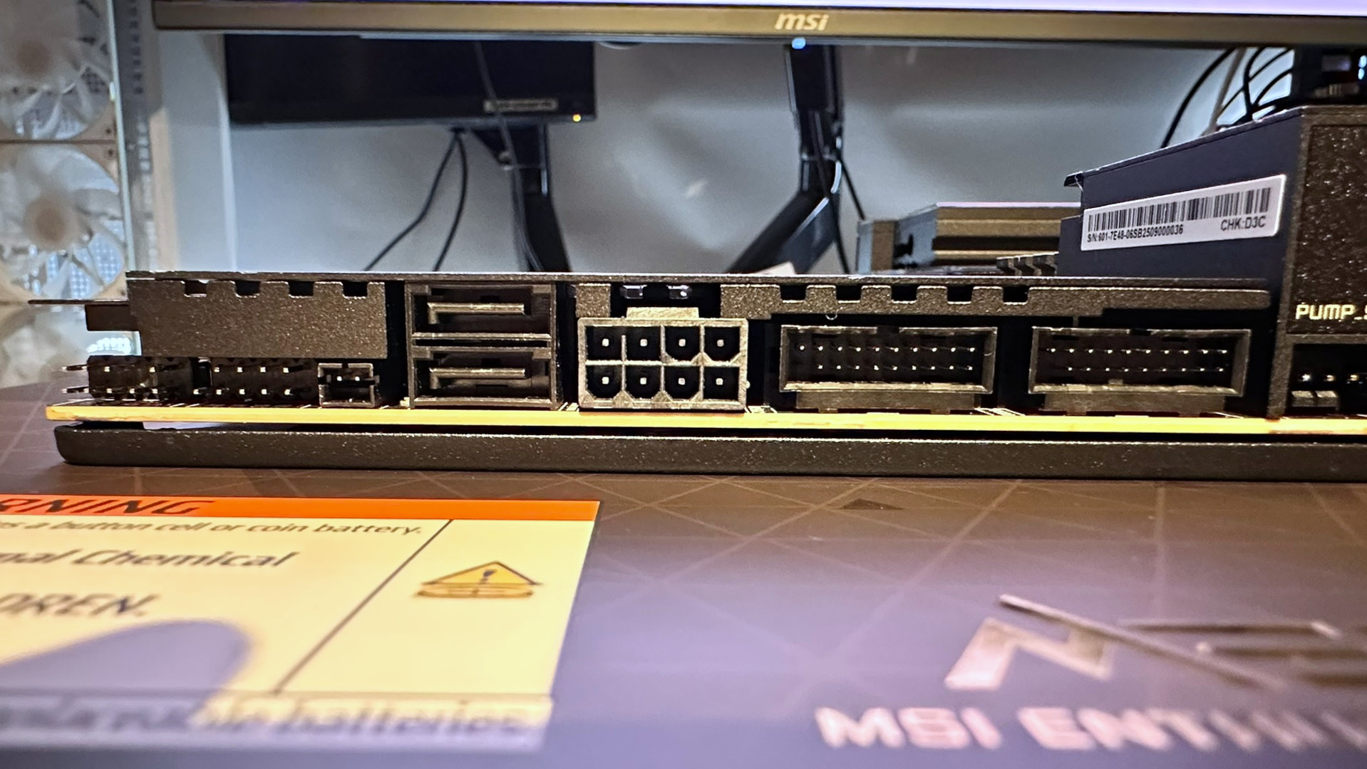 A photo showing some of the the various connector options on an MSI MEG X870E Godlike X Edition motherboard