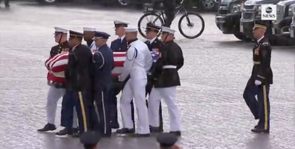 John McCain's casket being carried to the U.S. Capitol.
