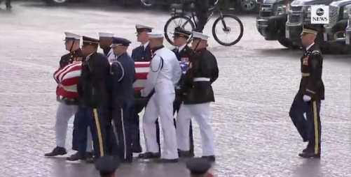 John McCain&amp;#039;s casket being carried to the U.S. Capitol.