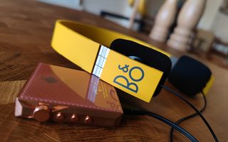 Yellow Form 2 headphones on a table