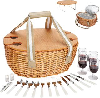 Picnic basket, silverware, and wine glasses