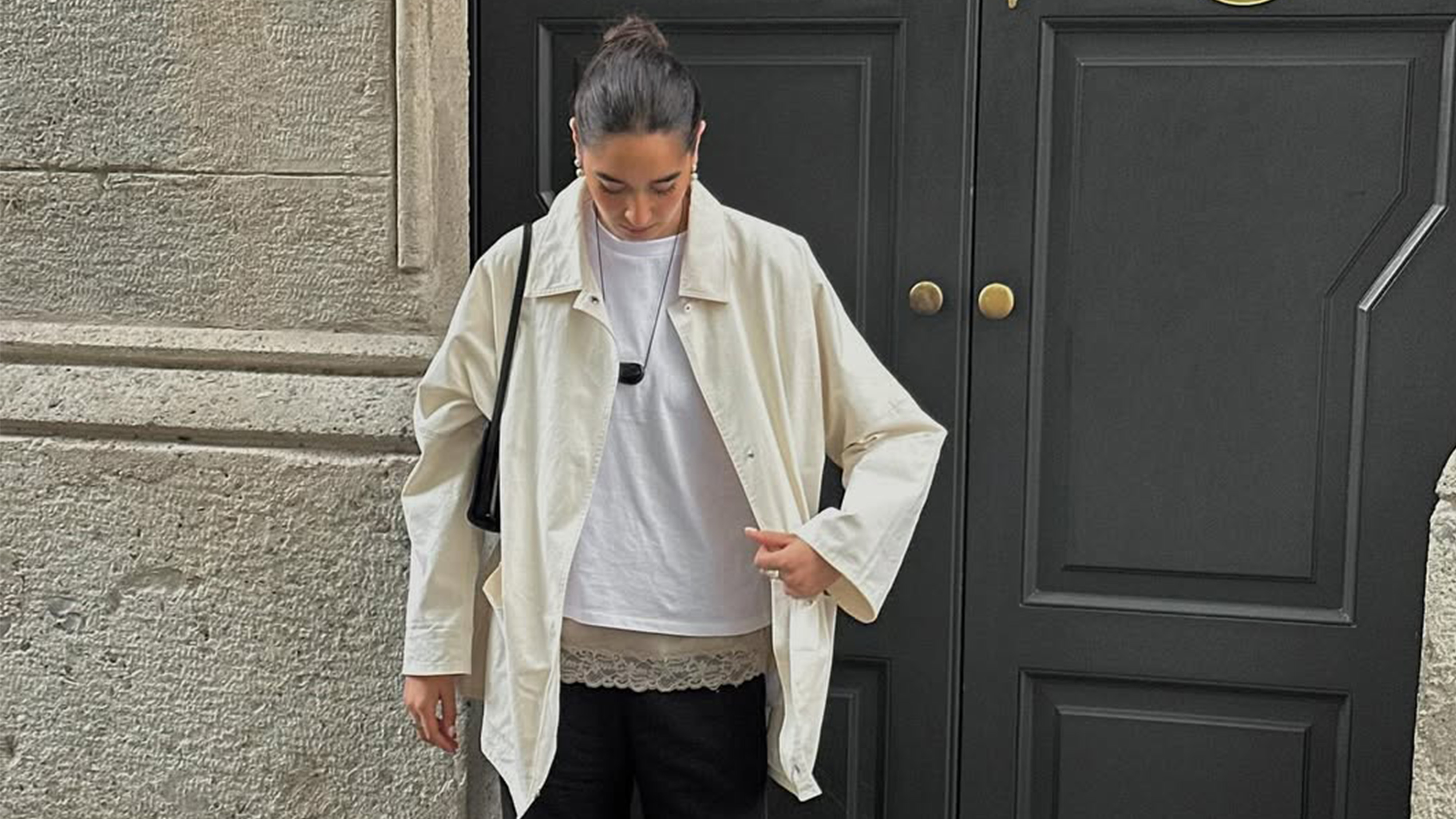 Selena Mual wearing a minimalist outfit.