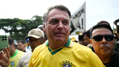 Brazil's former president Jair Bolsonaro arrives for a rally in Rio de Janeiro, Brazil, in March