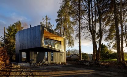 house exterior with surrounding trees