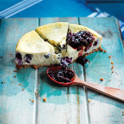baked cheesecake-blueberry-vanilla-cheesecake-desert-woman and home