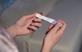 Sonya takes a pregnancy test in Neighbours, Paige