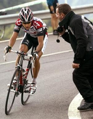 Carlos Sastre (CSC) rides to second on stage 11. He's still in touch with the leaders, almost two minutes back