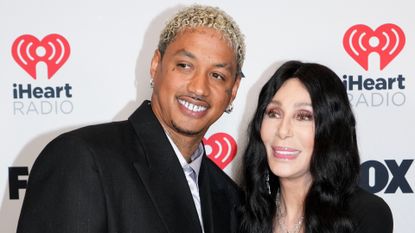 Alexander Edwards and Cher pose in the press room during the 2024 iHeartRadio Music Awards at Dolby Theatre on April 01, 2024 in Hollywood, California. 