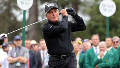Gary Player takes his shot as one of the Masters honorary starters