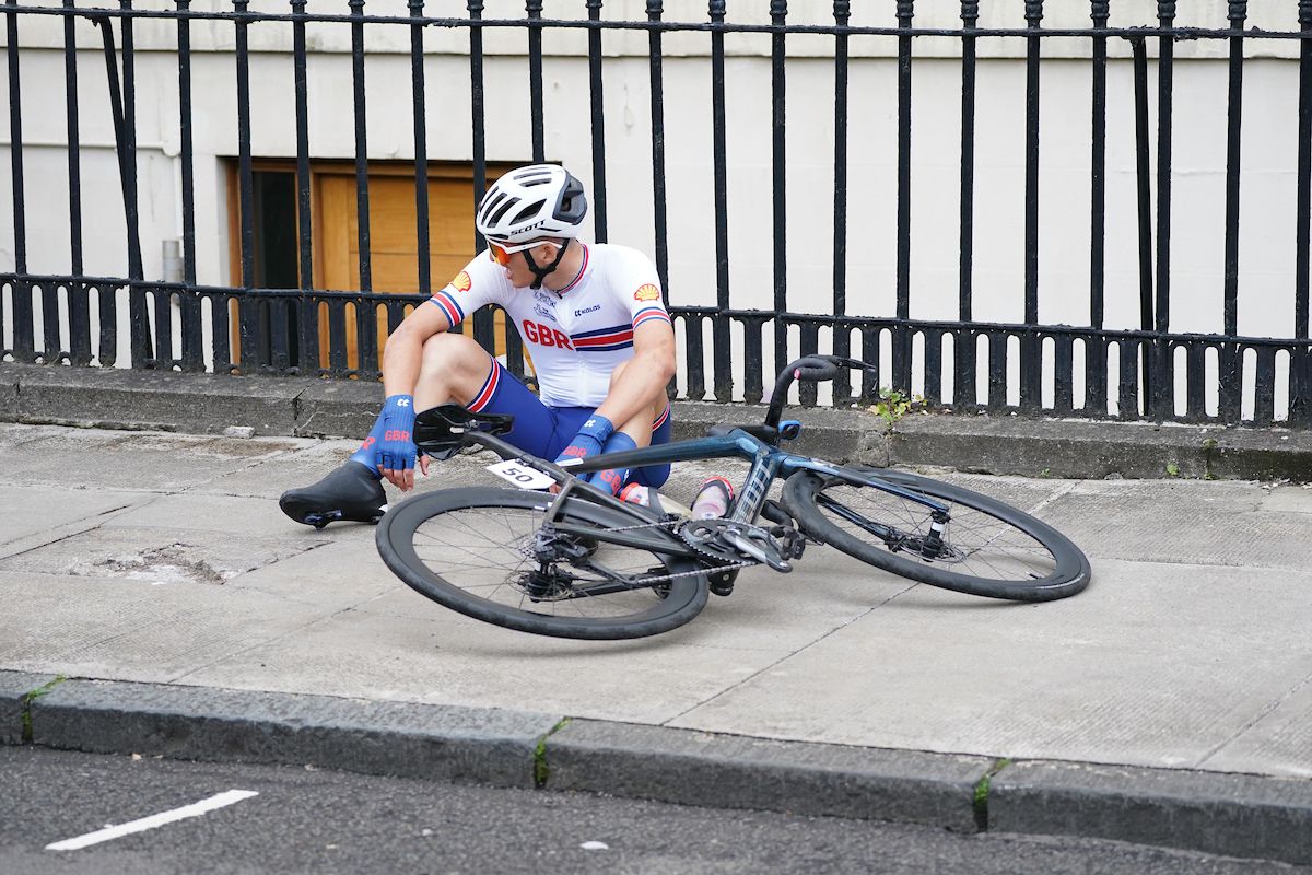 2023 UCI Cycling World Championships, Men's Junior Road Race, Glasgow, Lanarkshire, Scotland - Great Britain's Jed Smithson crashes out of the Men's Junior Road Race.