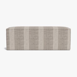A gray and white striped bench