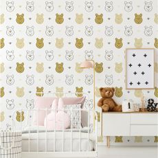 kids room with pooh wallpaper bed and teddy bear